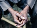hands of a Nigerian man together